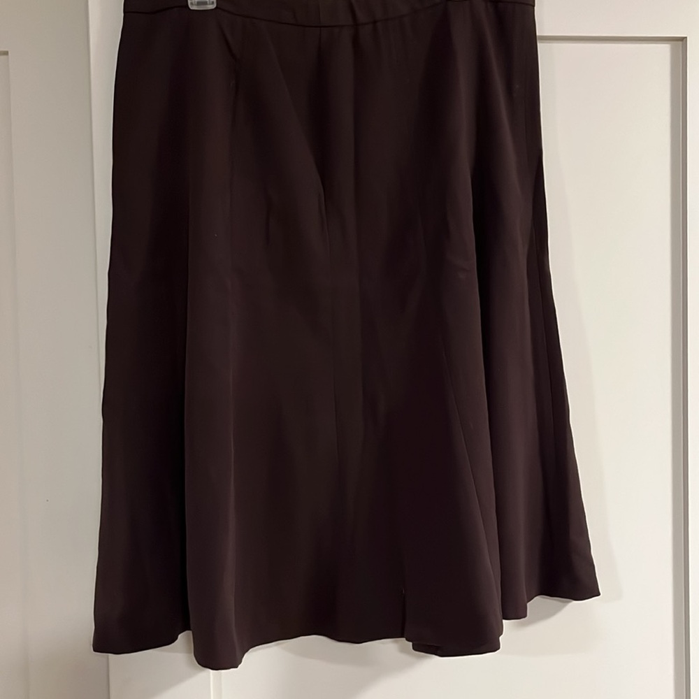 Gently used - worn only once or twice. East 5th Brown a-line skirt. Size 16